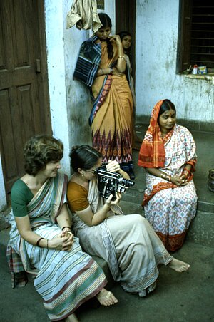 Louise Cort, Cynthia Cunningham Cort, and Sureswari Mishra, with Sureswari’s sister Kuni, filming at Sureswari’s home. Puri, 1980.