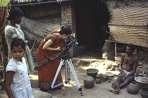 Cynthia Cunningham Cort preparing to film potter Hata Bishoi making pots. Tikarapada, 1980. Cynthia Cunningham Cort preparing to film potter Hata Bishoi making pots. Tikarapada, 1980.
